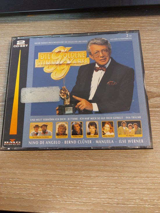 CDhoes met Dieter Thomas Heck met strik en gouden 'Die Goldene Stimmgabel' logo. Zes artiestenportretten aan de rechterzijde.
