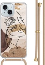 Casimoda® - Coque iPhone 15 avec cordon beige - Visage abstrait marron - Cordon détachable - TPU/acrylique