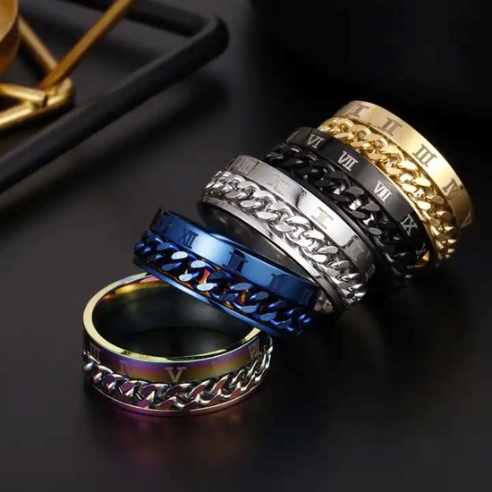 Drie ringen; goud, zilver en zwart, met draaibare schakelband en Romeinse cijfers.