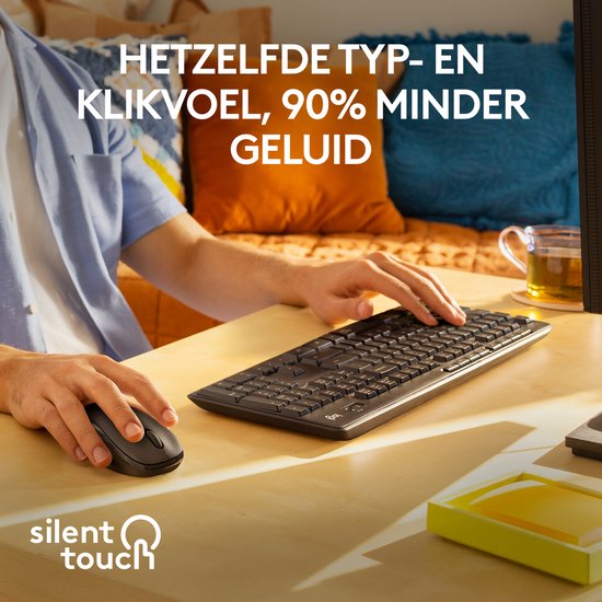 Hand op een zwart toetsenbord en muis. Tekst: HETZELFDE TYP- EN KLIKGEVOEL, 90% MINDER GELUID.