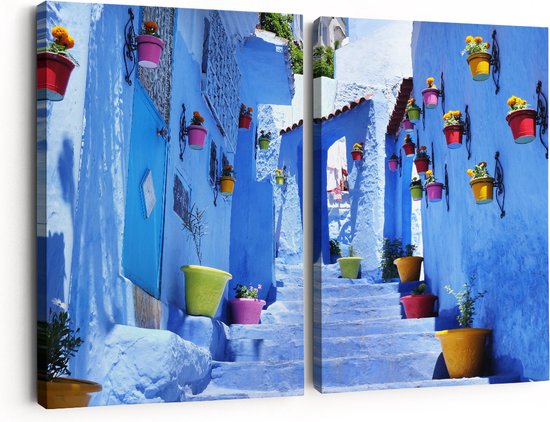 Artaza Canvas Schilderij Tweeluik Blauwe Huizen met Bloempotten in Chefchaouen, Marokko - 180x120 cm - Groot - Wanddecoratie Woonkamer - Schilderijen - Muurdecoratie