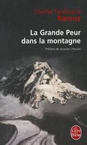 Boekomslag van 'La Grande Peur dans la montagne' van Charles Ferdinand Ramuz, met een schilderij van een berglandschap.