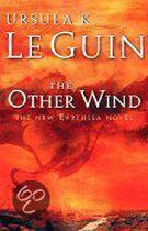 Boekomslag van 'The Other Wind' door Ursula K. Le Guin, met een oranje, wervelende achtergrond.