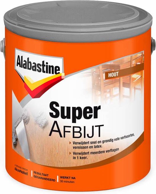 Alabastine Super Afbijt pot met oranje label. Houten tafel en stoelen in de achtergrond. Verwijdert verf.