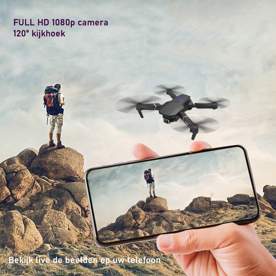 Drone met camera boven rotsachtig landschap. Weergave van live beelden op een smartphone.