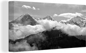 Canvas Schilderij Zicht over de Zwitserse Eiger bij de Berner Alpen - zwart wit - 40x20 cm - Wanddecoratie