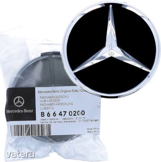 Emballage original de bouchons de moyeu Mercedes-Benz avec un bouchon de moyeu noir brillant avec étoile argentée.