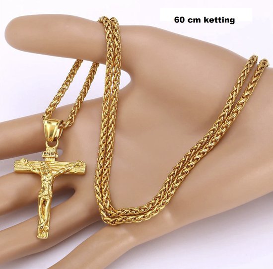 Gouden ketting met een kruisje van Jezus, 60cm, op een mannequinhand.
