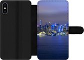 Bookcase Geschikt voor iPhone XS telefoonhoesje - New York - Skyline - Nacht - Met vakjes - Wallet case met magneetsluiting