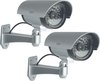 Twee zilverkleurige dummy buitencamera's van ELRO met 30 LED's en verstelbare montagebeugel.