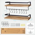 Twee houten wandplanken met zwarte frames en haken. Afmetingen zijn aangegeven in centimeters.