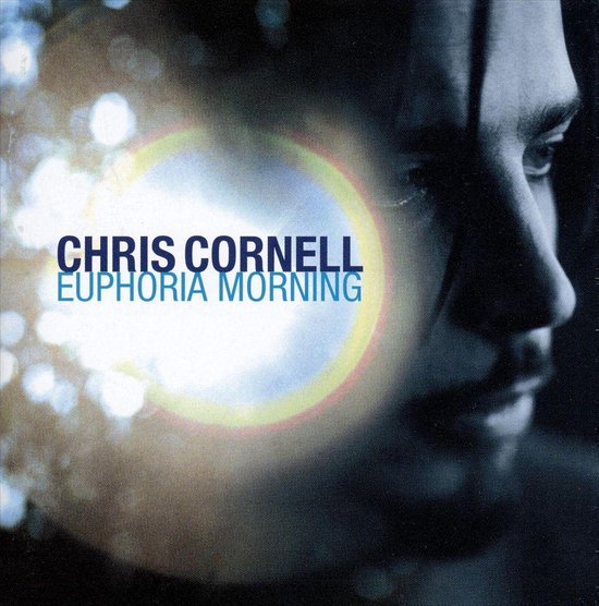 Albumhoes: Chris Cornell Euphoria Morning met close-up van zijn gezicht en lichteffecten.