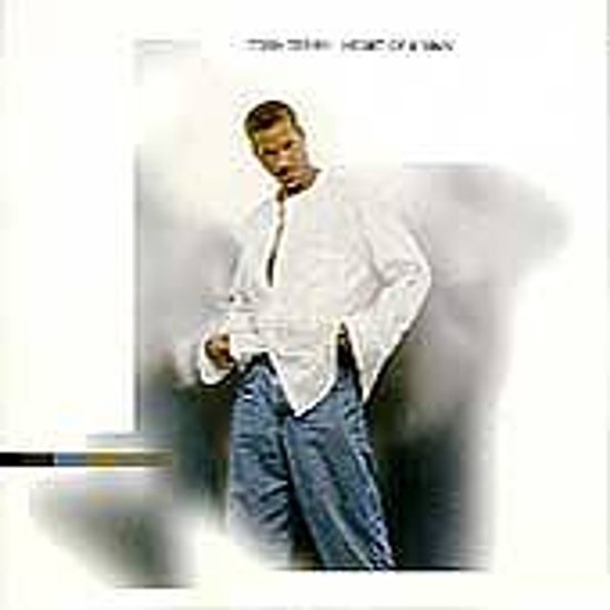 Tito Jackson, "Heart of a Man". Een man in een wit, open overhemd en jeans.
