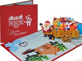 Popcards popup kerstkaarten - Kerstkaart Kerstman met Cadeautjes en Bosdieren in Handkar pop-up kaart 3D wenskaart