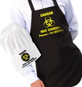 CKB LTD - Danger Man Cooking - BBQ schort - Mannen - Keukenschort - Heren - inclusief Koksmuts - Zwart - One size