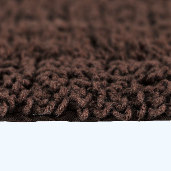 Detail van de lusjes van een bruine badmat