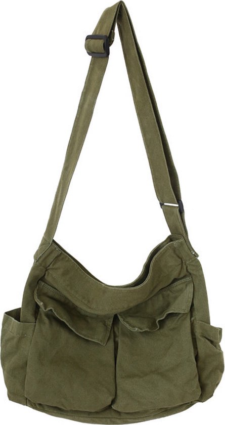 Groene canvas schoudertas met verstelbare band en twee klepzakken aan de voorkant.