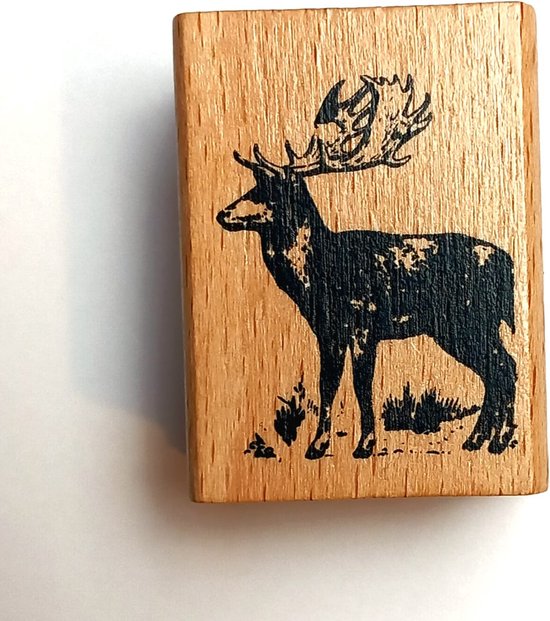 Een houten stempel met florale print. - N.V. Veilinghuis
