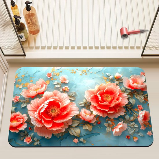 Badmat met een aquablauwe achtergrond versierd met grote koraalrode bloemen en gouden accenten.