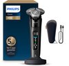 Philips i9000 scheerapparaat, opladerstandaard, reishoes en USB-kabel naast de verpakking. Met 5 jaar garantie.