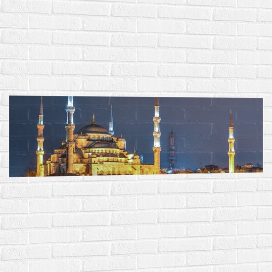 WallClassics - Muursticker - Sultan AhmetMoskee in de Nacht in Istanbul, Turkije - 120x40 cm Foto op Muursticker