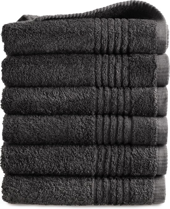 Pile de six serviettes anthracite avec bord côtelé.