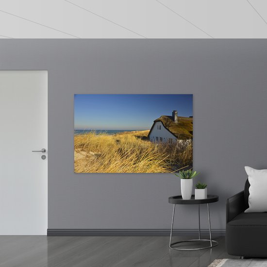 Poster (Mat) - Wit Huis aan Zee - 150x100 cm Foto op Posterpapier met een Matte look