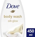 Witte Dove douchegelfles 'Silk Glow' met gouden tekst en zijdeachtige textuur.