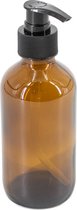 Glazen amber fles met zwarte plastic pomp