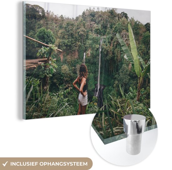 MuchoWow® Glasschilderij 180x120 cm - Schilderij acrylglas - Jungle - Waterval - Vrouw - Foto op glas - Schilderijen