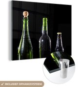 MuchoWow® Glasschilderij 160x120 cm - Schilderij acrylglas - Flessen op een donkere achtergrond - Foto op glas - Schilderijen