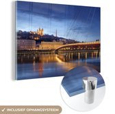 MuchoWow® Glasschilderij 90x60 cm - Schilderij acrylglas - Verlichting van de brug in de Franse stad Lyon - Foto op glas - Schilderijen