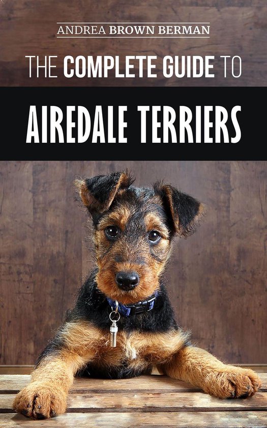 Airedale Terriër pup met bruine en zwarte vacht, met blauwe halsband, op houten achtergrond. "THE COMPLETE GUIDE TO AIREDALE TERRIERS".