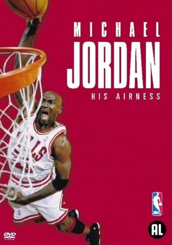Michael Jordan in zijn iconische rode shirt met nummer 23, maakt een spectaculaire dunk in een basketbalwedstrijd. De tekst 'MICHAEL JORDAN HIS AIRNESS' staat prominent op de rode achtergrond.