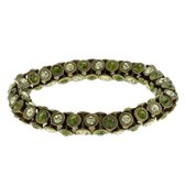 Oud goud kleurige tonnetjes armband met groene stenen