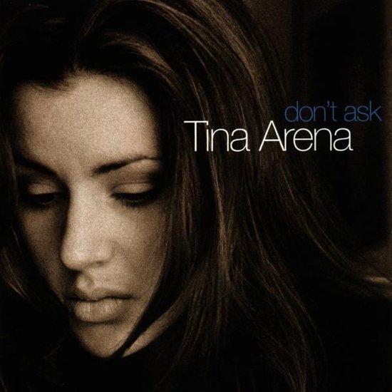 Portret van Tina Arena, met de tekst 'don't ask' en 'Tina Arena'.