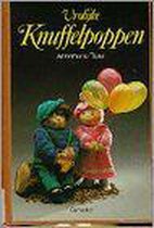 Vrolijke knuffelpoppen