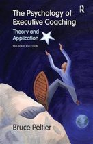 Boek 'The Psychology of Executive Coaching' met op de kaft een man die naar een ster grijpt, met een rots en maan op de achtergrond.
