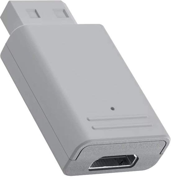 Een grijze HDMI-adapter met een kleine ronde indicator en ventilatiegleuven. De connector is naar boven gericht.