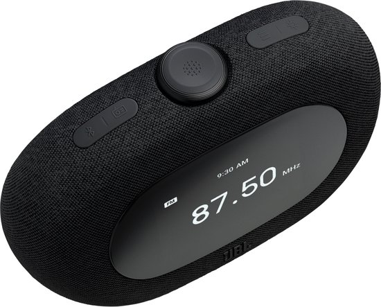 Zwarte JBL wekkerradio met een ovaal scherm waarop "FM 9:30 AM" en "87.50 MHZ" staat.