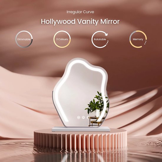 Een golvende Hollywood make-upspiegel met ledverlichting staat op een roze podium. Iconen tonen 'Dimmable', '3 Colours', 'Rotatable', 'Memory'.