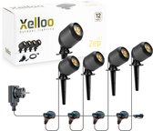 Set van vier zwarte 12V Xelloo Zep grondspots, inclusief stekker, 8m kabel en de verpakking.