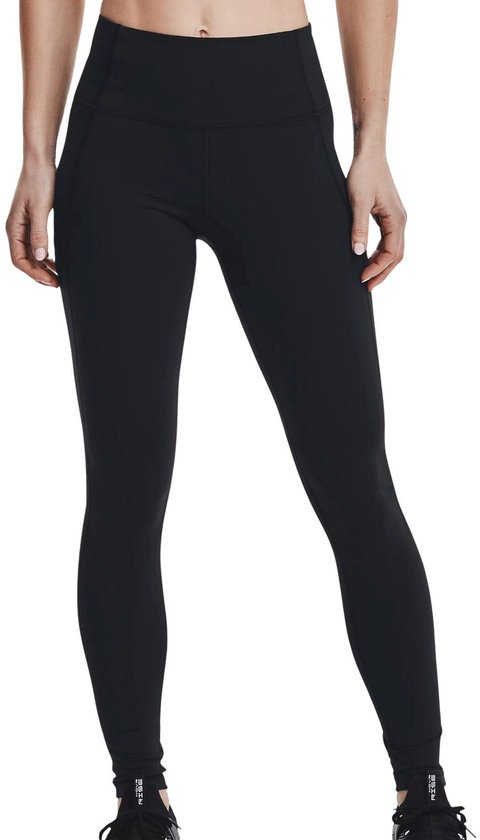 Zwarte trainingslegging voor dames met een hoge taille en zakken aan de zijkant. Een model draagt de legging.