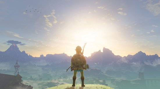 Link staat op een heuvelrug met een boog en pijlen, kijkend naar de zonsopgang boven de bergen van Hyrule.
