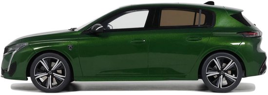 Groene Peugeot 308 GT modelauto, zijaanzicht.