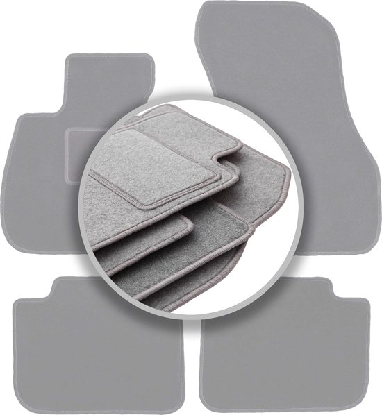 Ensemble de quatre tapis de sol gris avec une image intégrée de la pile.