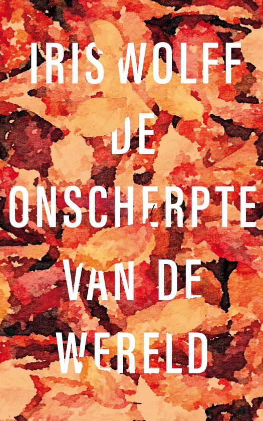 Boekkaft met abstracte rode en oranje achtergrond en witte tekst 'IRIS WOLFF DE ONSCHERPTE VAN DE WERELD'.
