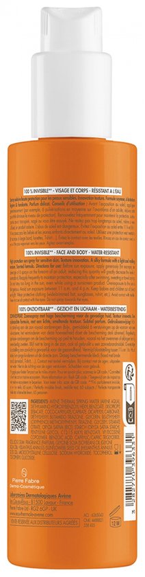 Achterkant van een oranje fles met witte dop, met ingrediënten en productinformatie in meerdere talen. Inhoud 200 ml.