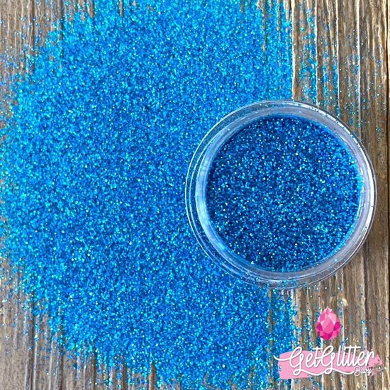 Foto: Getglitterbaby fijne poeder biologische biologisch milieuvriendelijke afbreekbare festival glitters voor lichaam en gezicht jewels vegan bio biodegradable face body glitter blauw