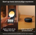 Twee opties om Philips Hue te bedienen: een smartphone met de Hue app en een Amazon Echo Dot speaker.